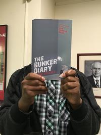 Alex F. holding The Bunker Diary by Kevin Brooks